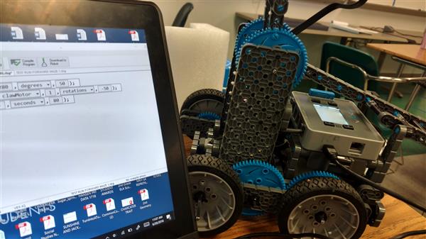 robot and a laptop